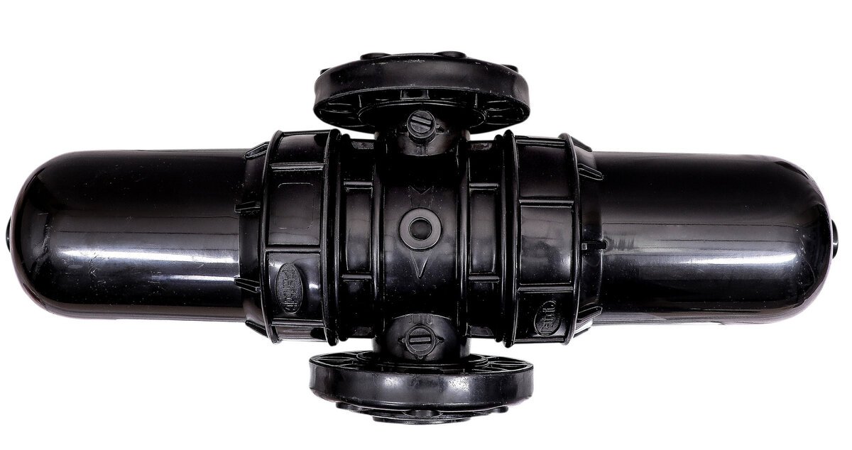 Disc filter with grooved cartridge and clogging indicator